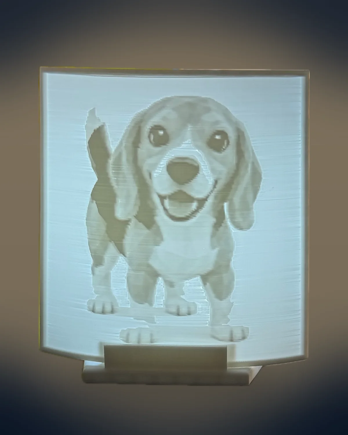 Beagle portrait lithophane glowing on its stand